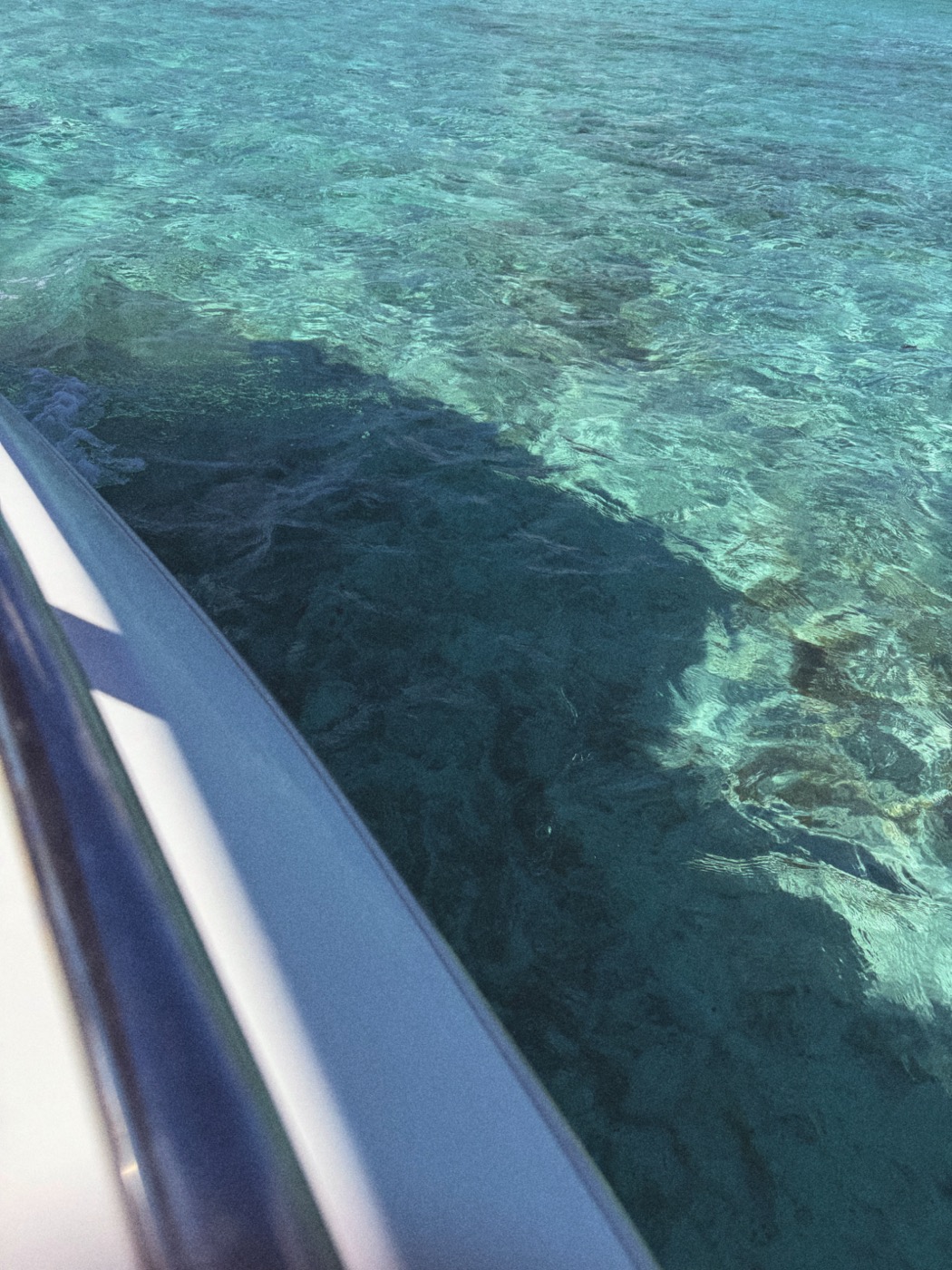 Turquoise water from a boat
